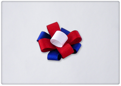 Red white and blue ribbon flower
